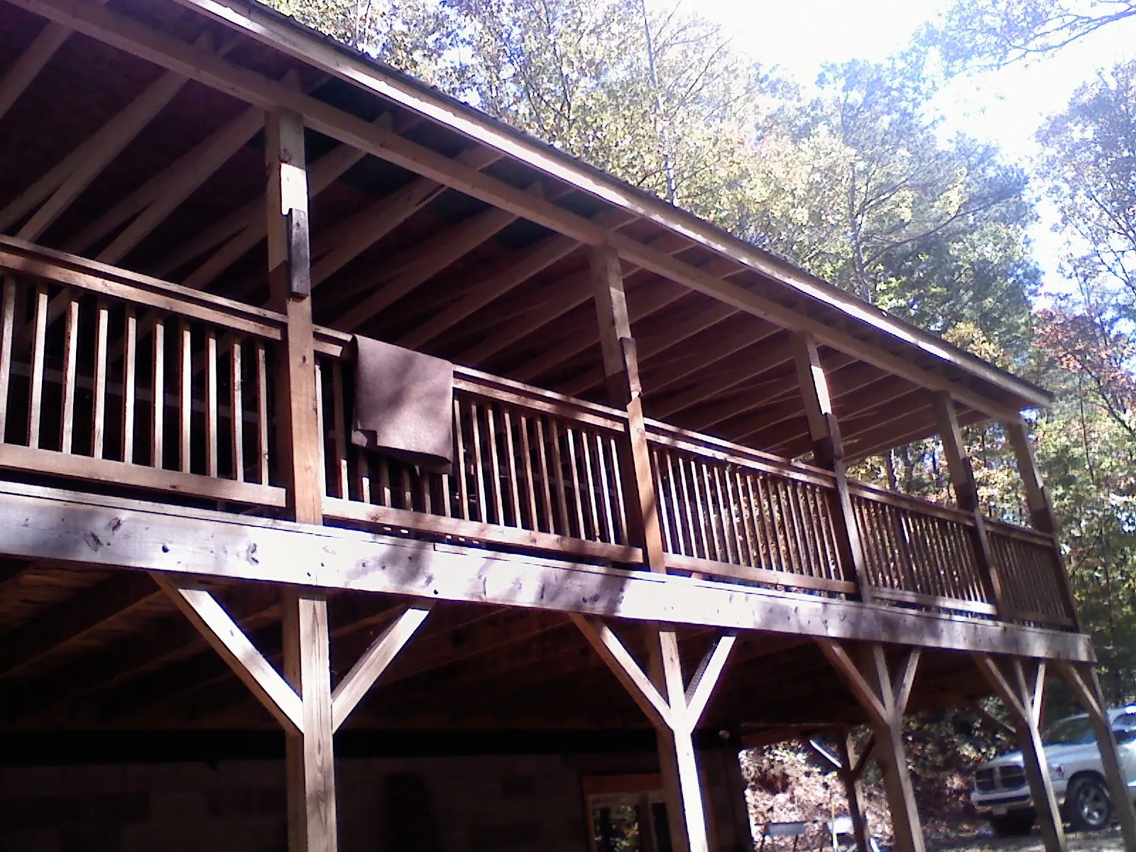Timber framing under a new elevated porch and deck — Roof Leak Repair in Mount Dora by Roofing Brothers